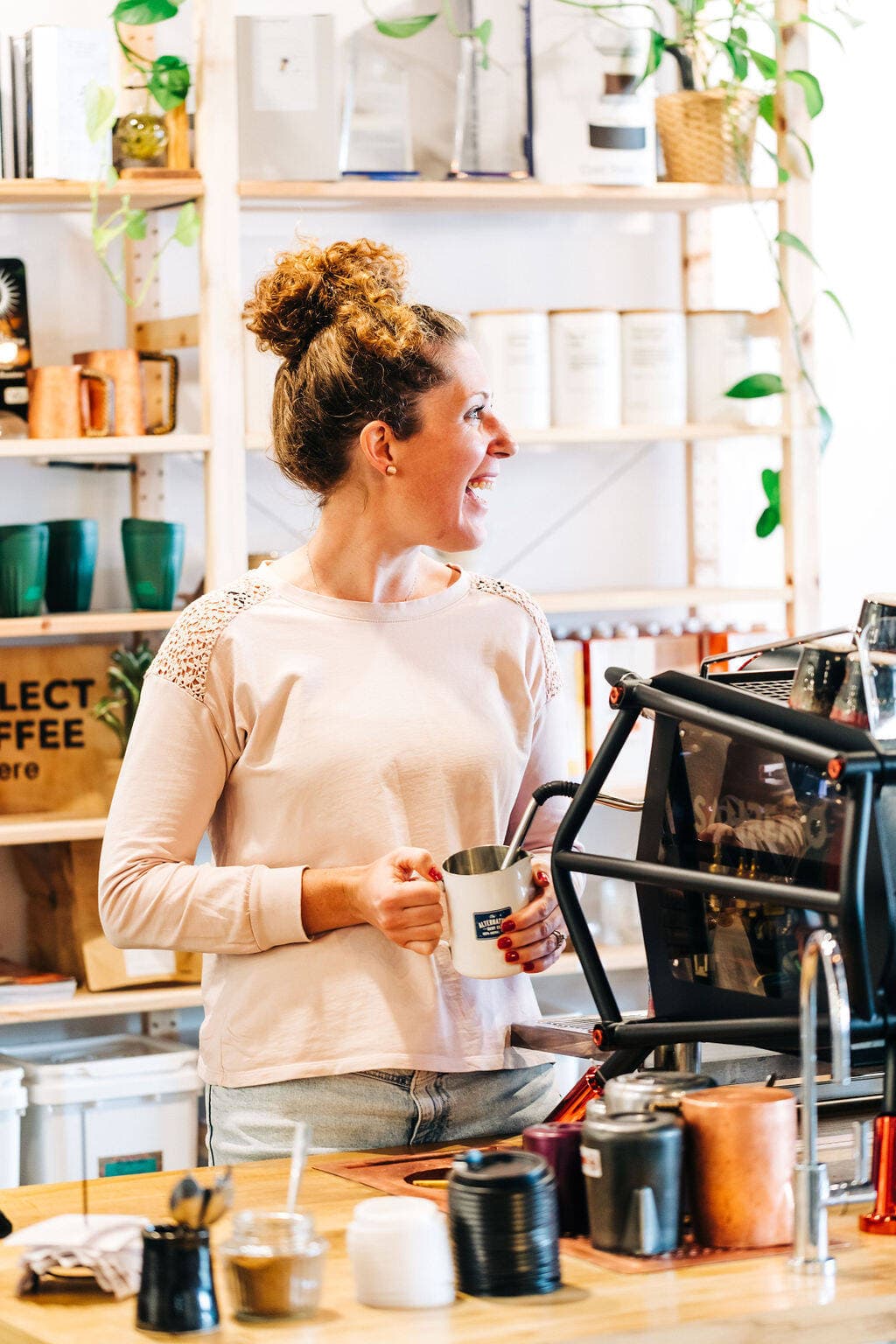 Barista pouring specialty coffee at Trader & Co. in Yass